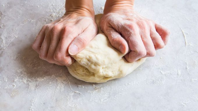 Image showing a man doing a dough